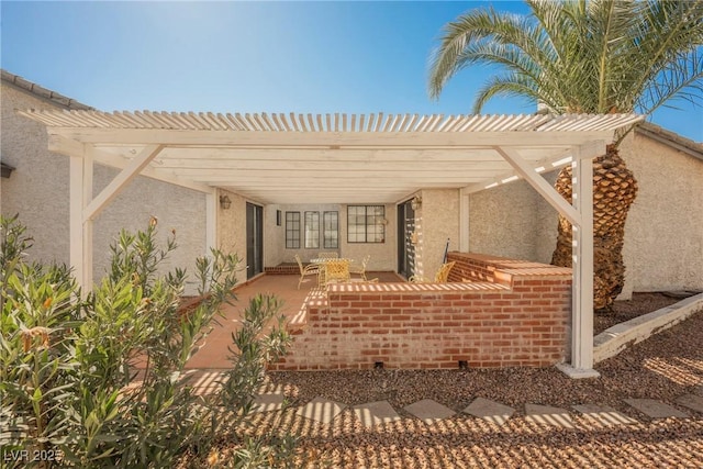 view of patio with a pergola