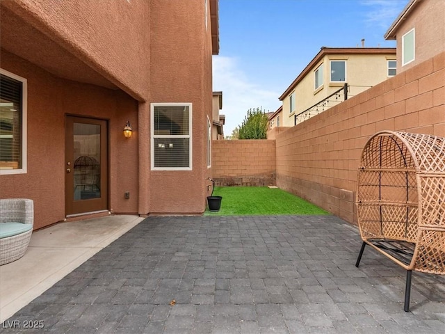 view of patio with a fenced backyard