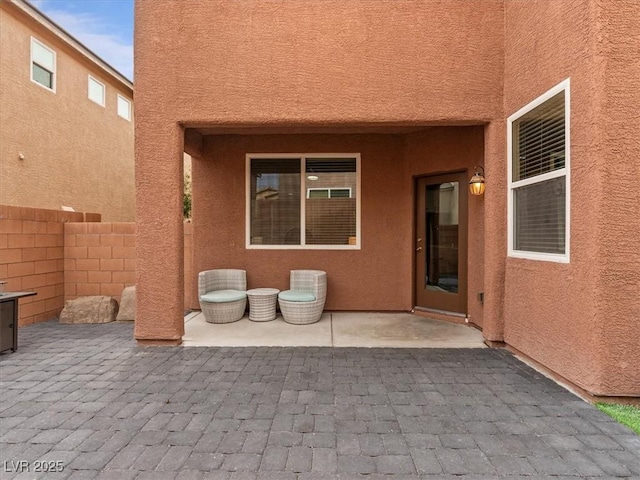 view of patio with fence