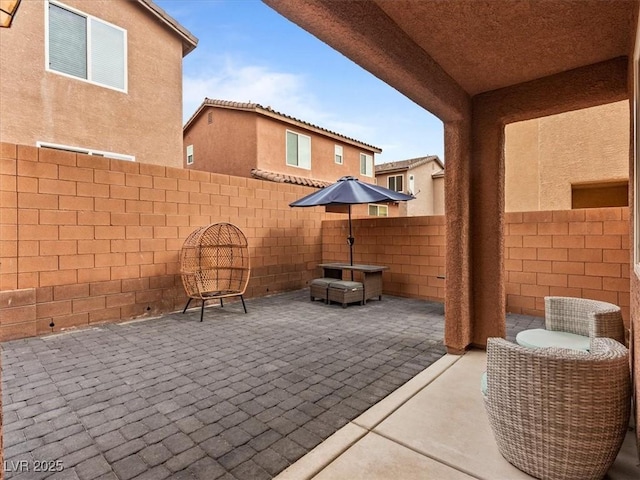 view of patio featuring a fenced backyard