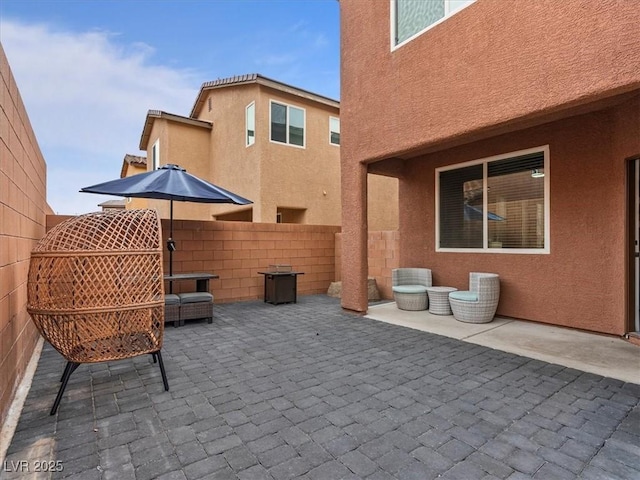 view of patio with fence