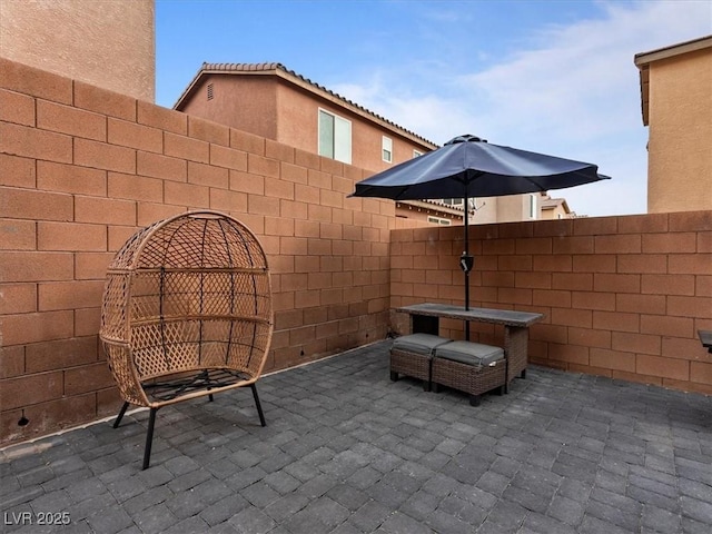 view of patio with fence