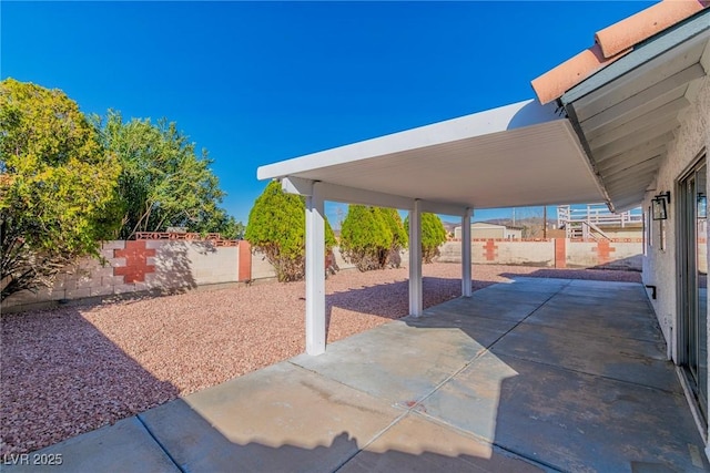 view of patio with a fenced backyard