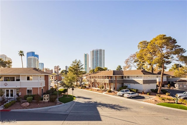 view of street with a city view and curbs