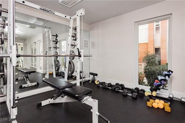 workout area with baseboards