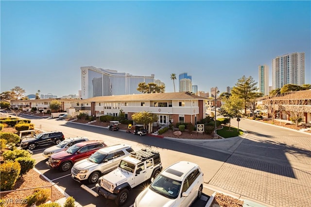737 Oakmont Ave Unit 1202, Las Vegas, NV 89109 - view of property with a view of skyline and uncovered parking