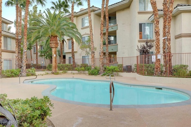 community pool with fence