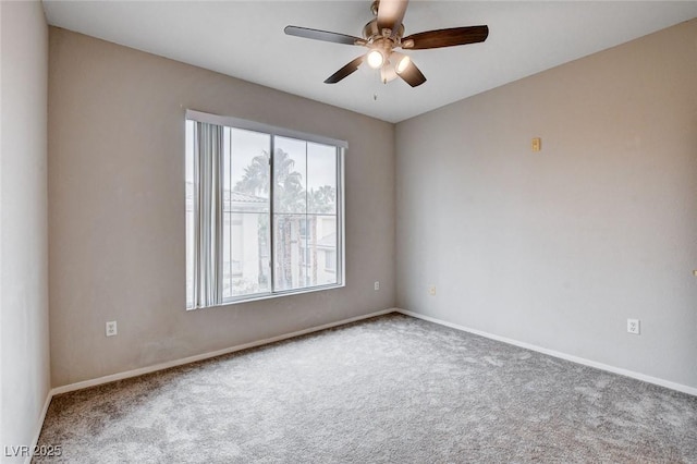 unfurnished room featuring ceiling fan, carpet floors, and baseboards