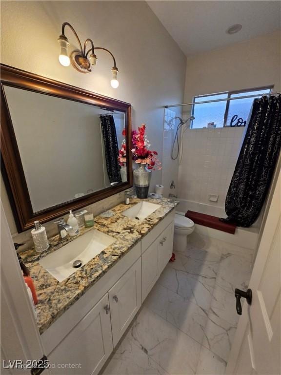 bathroom with toilet, shower / bathtub combination with curtain, marble finish floor, and a sink