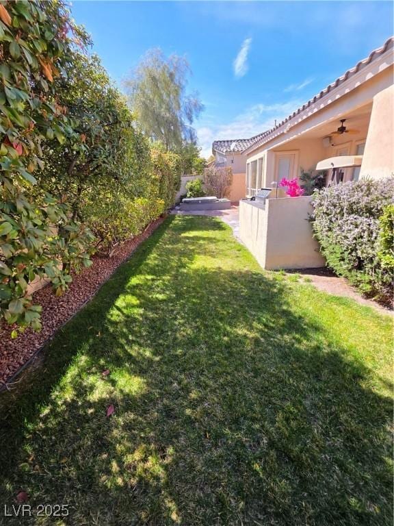 view of yard with fence