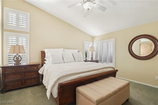 bedroom with ceiling fan, baseboards, vaulted ceiling, and light colored carpet