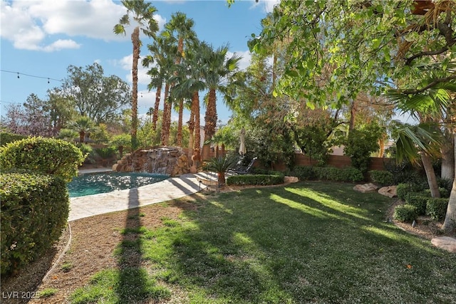 view of yard featuring fence