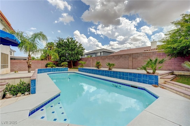 view of swimming pool featuring a fenced backyard and a fenced in pool