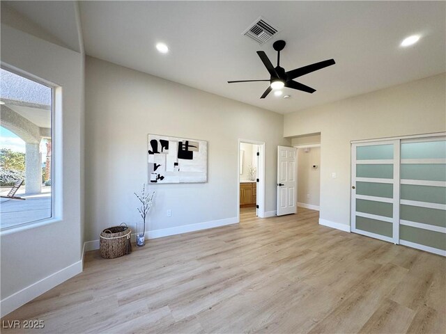 unfurnished bedroom featuring recessed lighting, visible vents, baseboards, and light wood-style floors