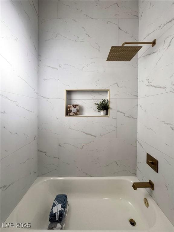 bathroom with shower / bathing tub combination