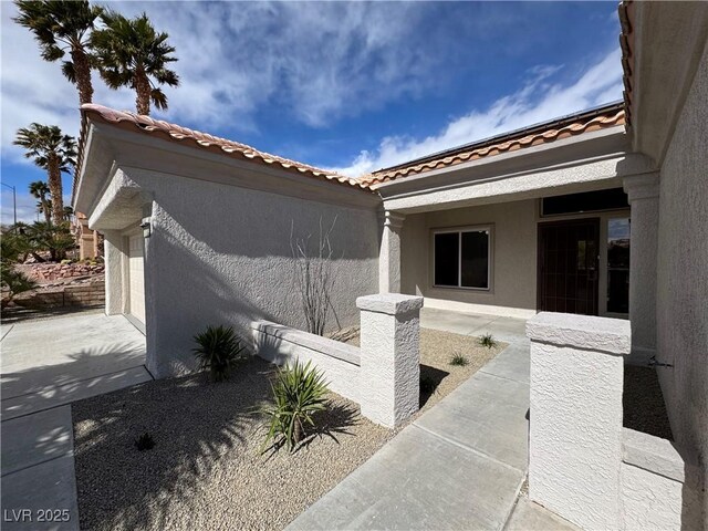 view of property exterior with stucco siding