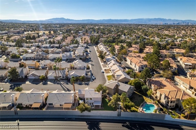 birds eye view of property featuring a residential view and a mountain view