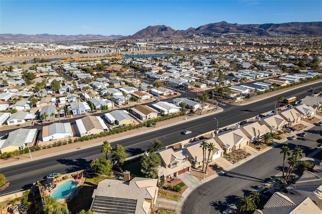 aerial view with a residential view and a mountain view