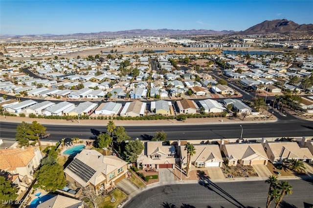 bird's eye view with a residential view and a mountain view