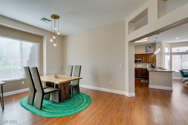 9816 Gerald Ct, Las Vegas, NV 89134 - dining room featuring wood finished floors and baseboards