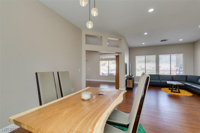 dining space featuring baseboards, visible vents, dark wood-style flooring, and recessed lighting