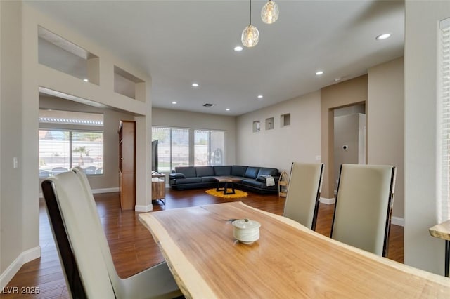 9816 Gerald Ct, Las Vegas, NV 89134 - dining space with plenty of natural light, dark wood finished floors, and recessed lighting
