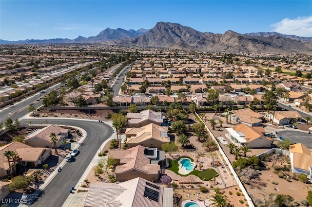 9816 Gerald Ct, Las Vegas, NV 89134 - aerial overview of property's location with nearby suburban area and a mountain backdrop