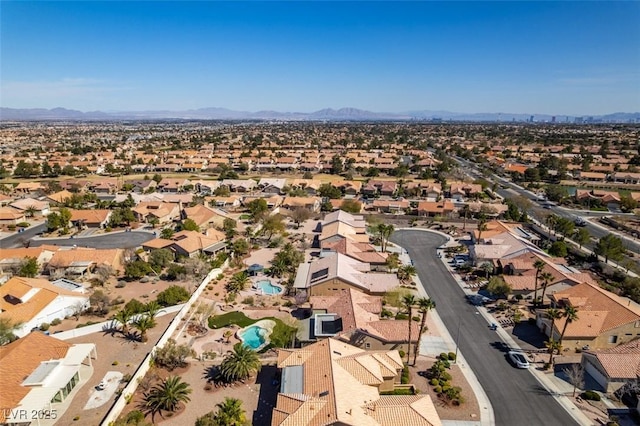 drone / aerial view with a residential view and a mountain view