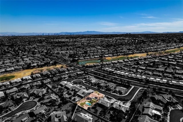 drone / aerial view featuring a mountain view