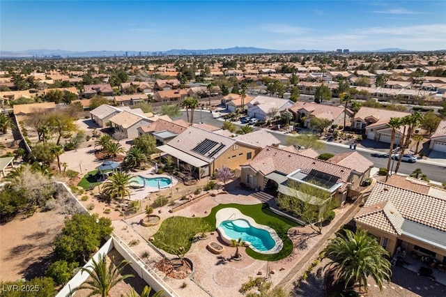 9816 Gerald Ct, Las Vegas, NV 89134 - aerial view of residential area featuring a pool and a mountain backdrop