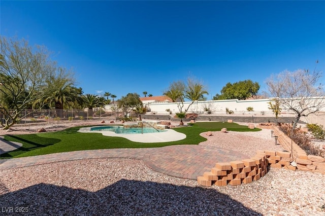 exterior space featuring a fenced backyard, a patio, and a swimming pool