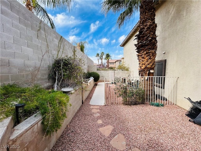 view of yard featuring a fenced backyard