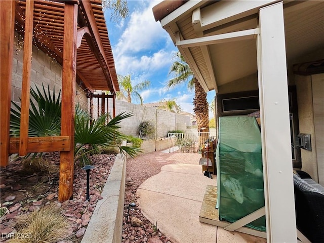 exterior space featuring a fenced backyard