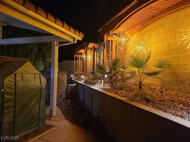 patio at night with fence