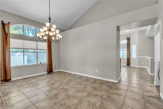 3047 Whispering Crest Dr, Henderson, NV 89052 - spare room with a chandelier, vaulted ceiling, tile patterned flooring, and baseboards