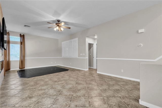 3047 Whispering Crest Dr, Henderson, NV 89052 - spare room with ceiling fan and baseboards
