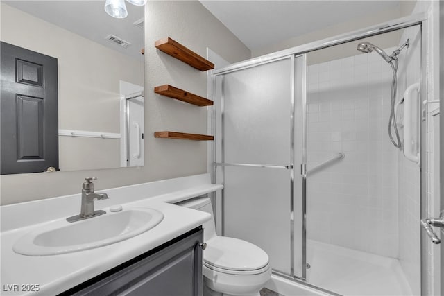 3047 Whispering Crest Dr, Henderson, NV 89052 - full bathroom featuring a stall shower, vanity, and toilet