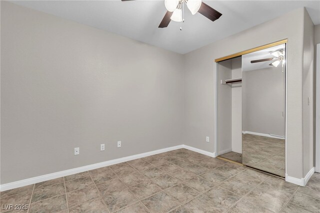 3047 Whispering Crest Dr, Henderson, NV 89052 - unfurnished bedroom with baseboards, a ceiling fan, and a closet