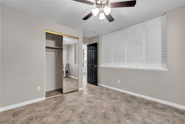3047 Whispering Crest Dr, Henderson, NV 89052 - unfurnished bedroom with a closet, baseboards, and a ceiling fan