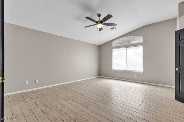 3047 Whispering Crest Dr, Henderson, NV 89052 - spare room featuring lofted ceiling, a ceiling fan, light wood-type flooring, and baseboards