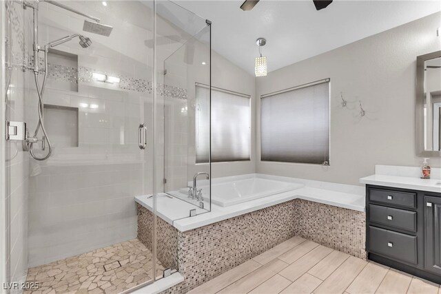 3047 Whispering Crest Dr, Henderson, NV 89052 - bathroom with a bath, a stall shower, and vanity