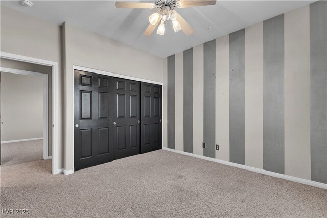 3047 Whispering Crest Dr, Henderson, NV 89052 - unfurnished bedroom featuring carpet flooring, baseboards, ceiling fan, and a closet