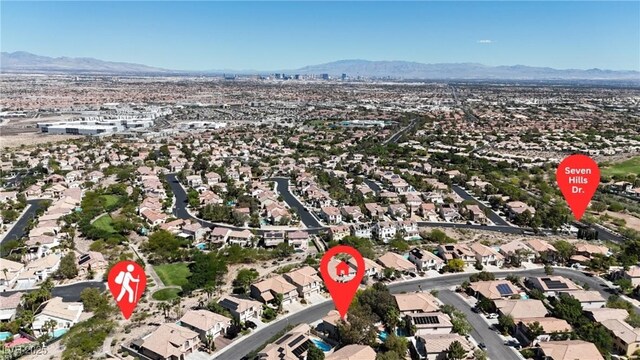 3047 Whispering Crest Dr, Henderson, NV 89052 - aerial view of property's location featuring a mountain backdrop and nearby suburban area