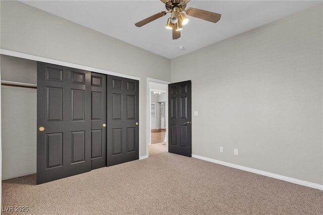 3047 Whispering Crest Dr, Henderson, NV 89052 - unfurnished bedroom with carpet, baseboards, a closet, and a ceiling fan