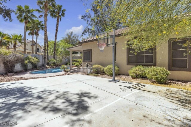 3047 Whispering Crest Dr, Henderson, NV 89052 - fenced backyard with a patio
