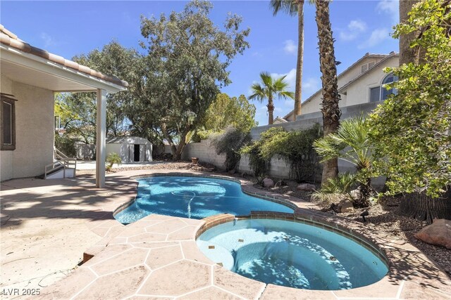 3047 Whispering Crest Dr, Henderson, NV 89052 - view of pool featuring a patio, a pool with connected hot tub, and a fenced backyard