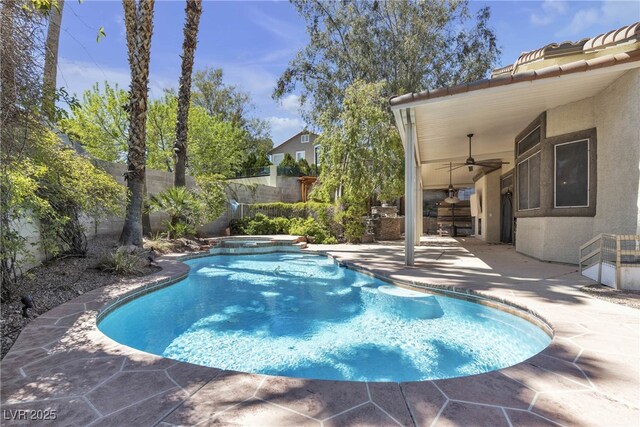 3047 Whispering Crest Dr, Henderson, NV 89052 - view of pool featuring ceiling fan, a patio, a fenced backyard, and a pool with connected hot tub