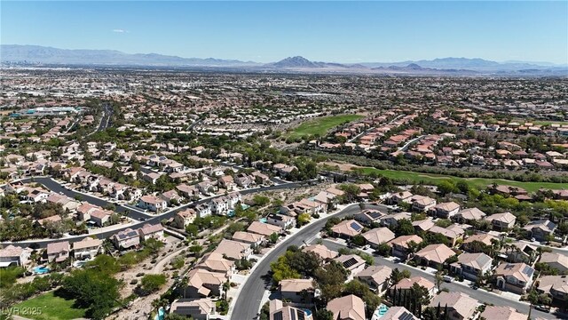3047 Whispering Crest Dr, Henderson, NV 89052 - aerial overview of property's location with mountains and nearby suburban area