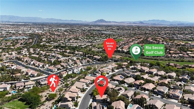 3047 Whispering Crest Dr, Henderson, NV 89052 - aerial overview of property's location featuring a mountainous background and nearby suburban area