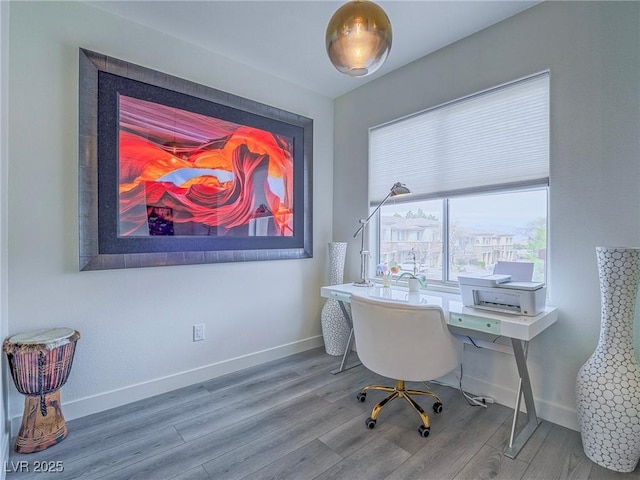 office area featuring wood finished floors and baseboards